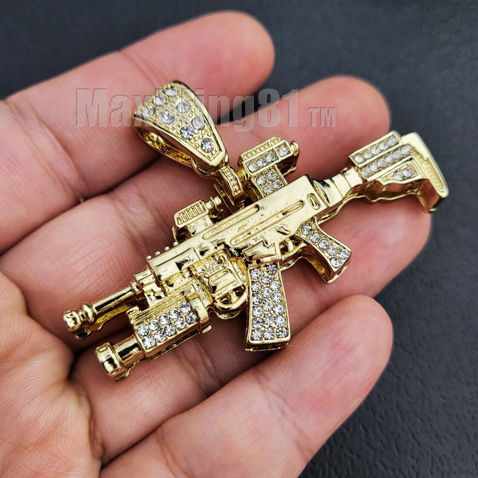 Gold Plated Cubic Zirconia Machine Gun & 14K Stamped Brass Cuban Chain Necklace